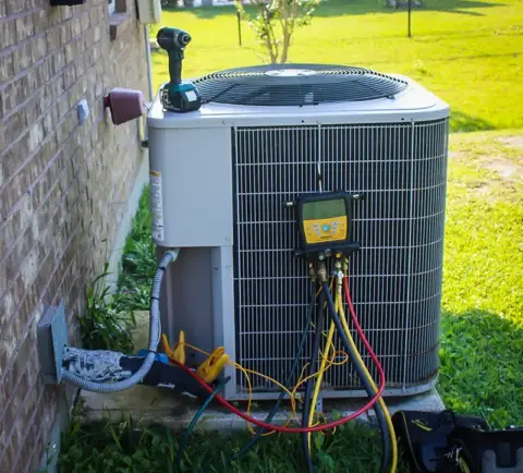 A customer's air conditioning unit, being diagnosed for problems that could be causing lack of cooling in the home.